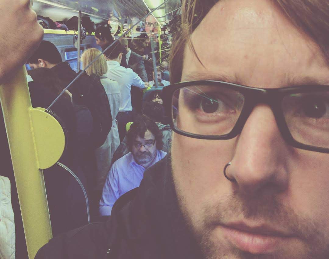 Andy Parker looking ahead on a train